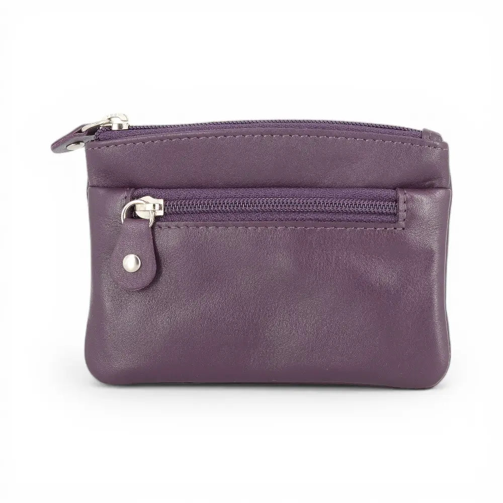 Purple leather wallet with two zippers on a white background