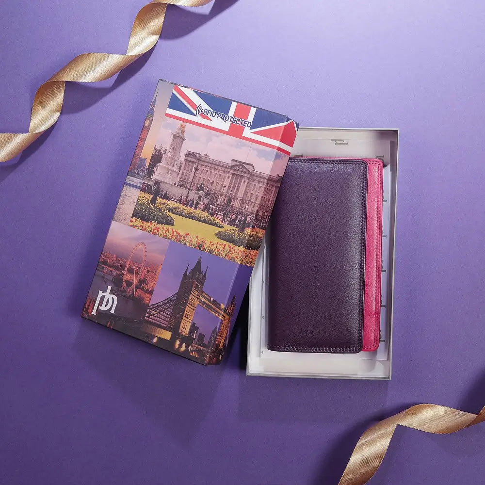 Lifestyle view of Purple wallet with pink bottom section on a white background