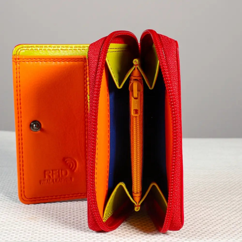  red wallet with a visible brand logo on a textured surface.