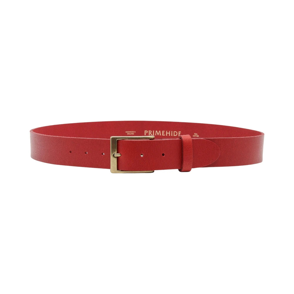 Red belt with a gold buckle on a white background