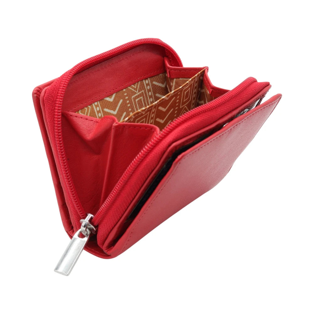 Red wallet with a patterned interior on a white background