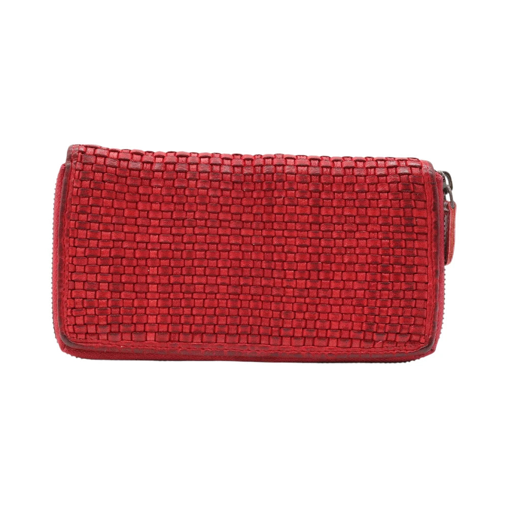 Red leather purse on a white background