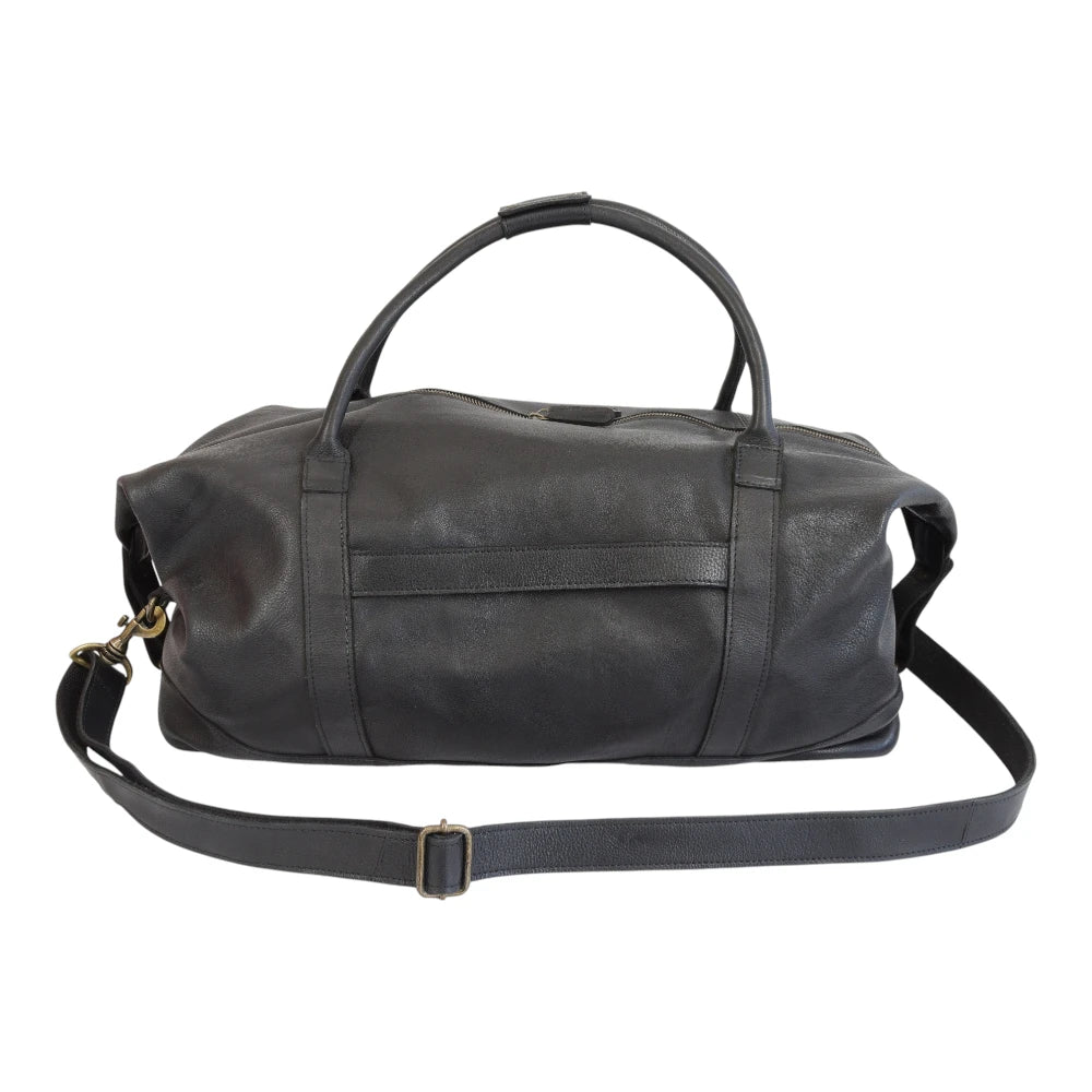 Black leather holdall  bag with a strap on a white background