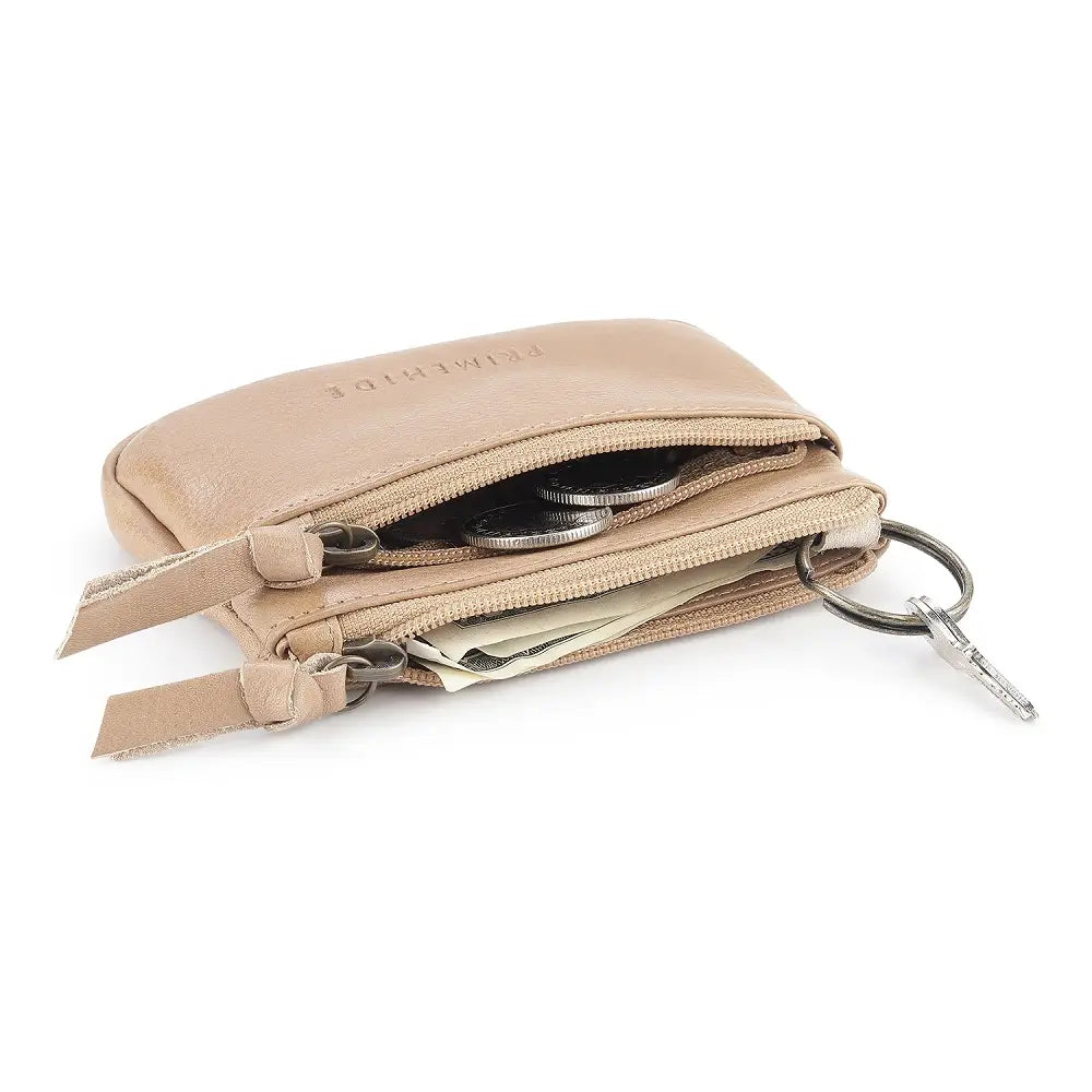Sand  leather wallet with coins, cards, and a key on a white background