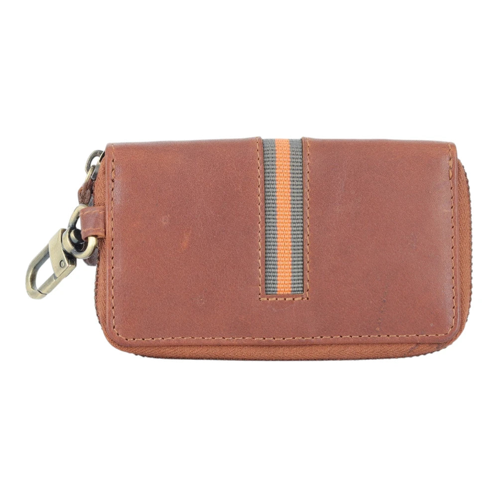 Tan leather key case with a keychain on a white background