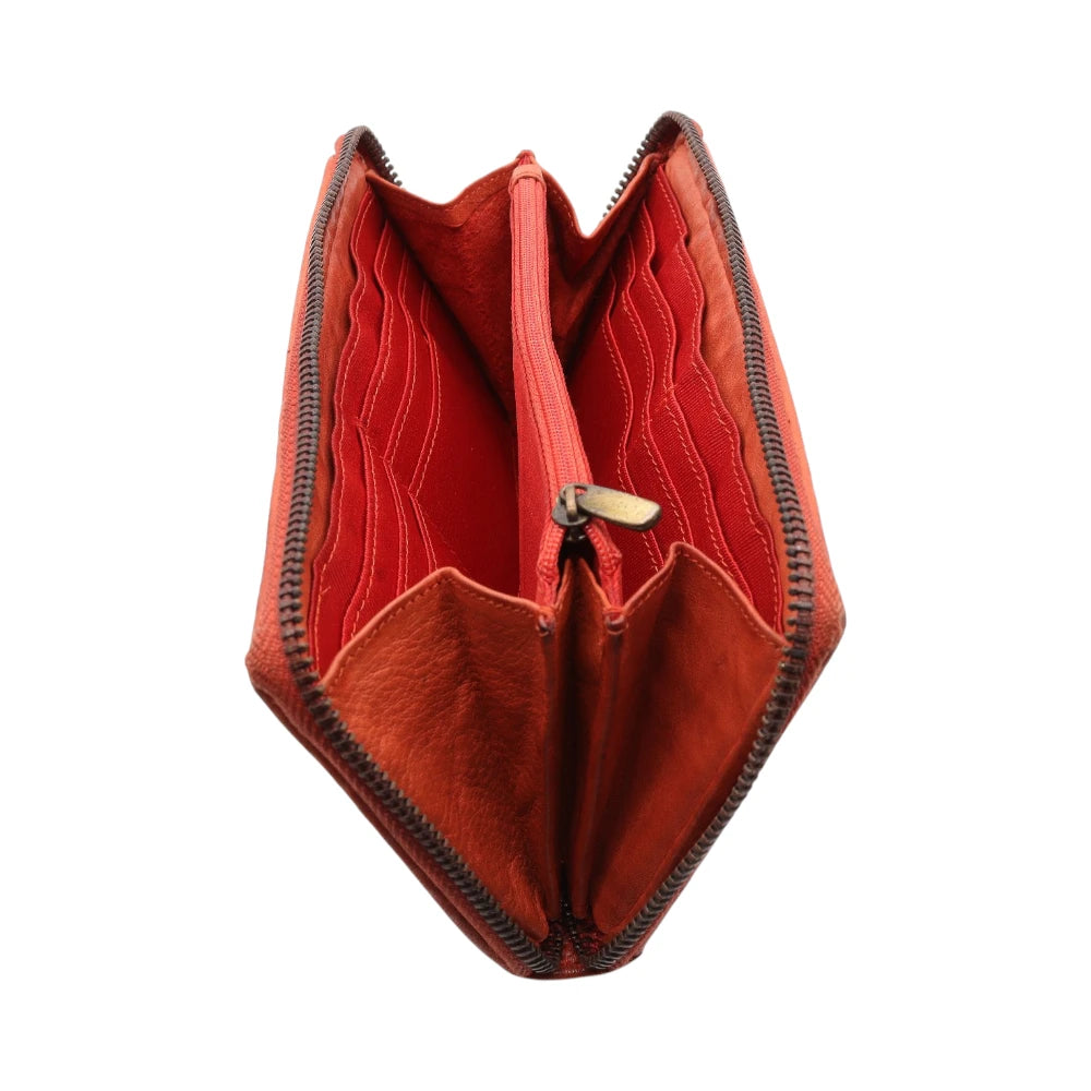 Tan leather handbag with a zipper on a white background