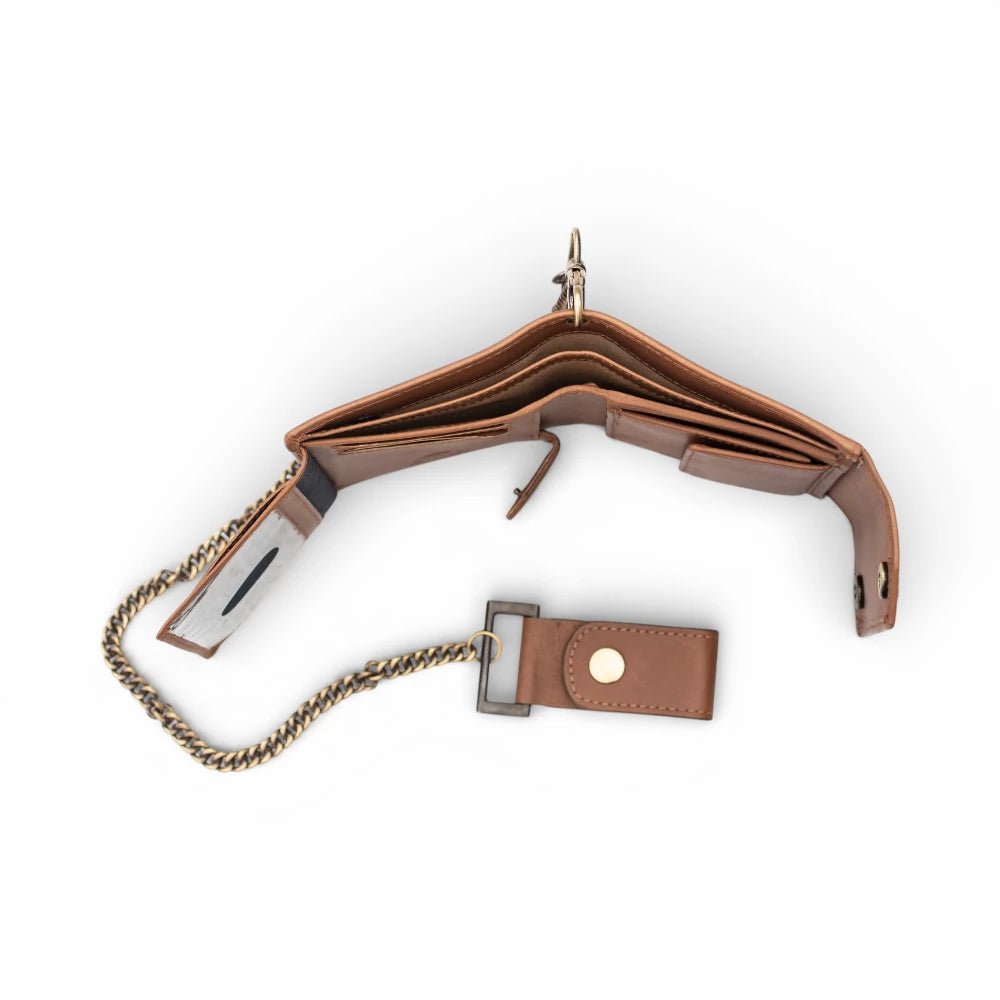 Tan leather wallet with chain and belt on a white background