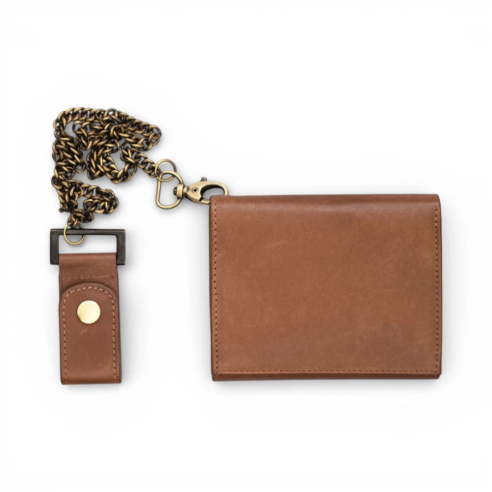 Tan leather wallet with chain on a white background