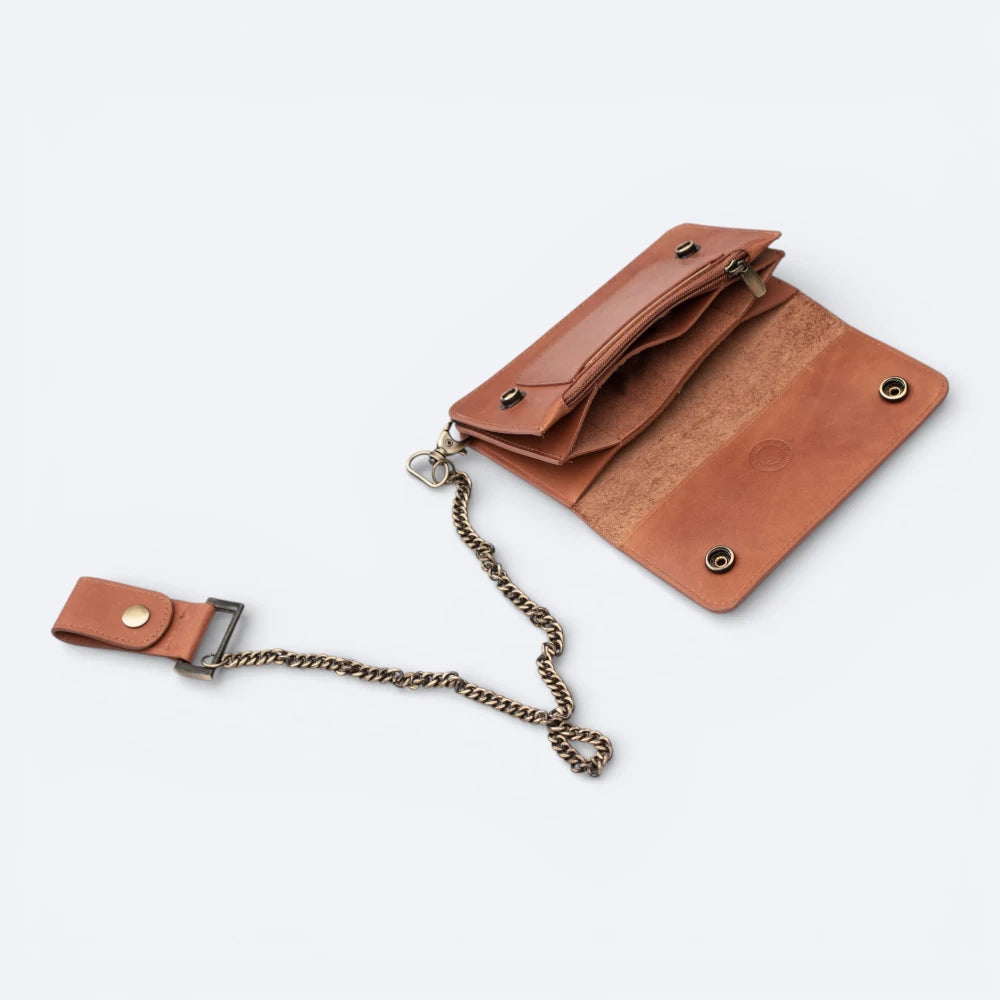 Tan leather wallet with chain on a white background