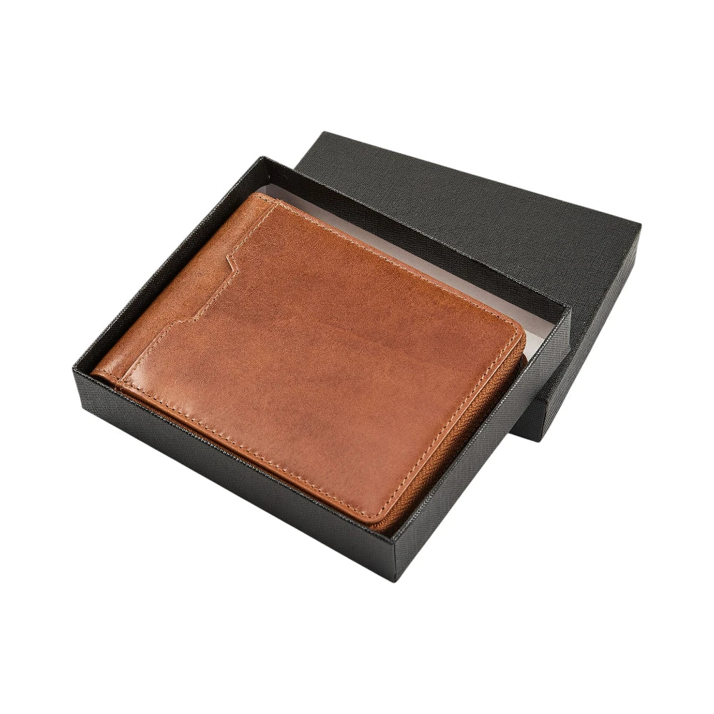Tan leather wallet in a black box on a white background