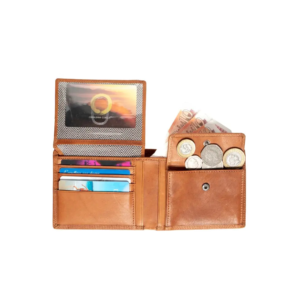 Open Tan leather wallet with cards and coins on a white background