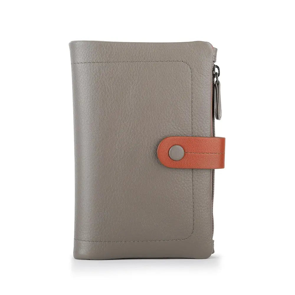 Taupe wallet with an orange zipper pull on a white background