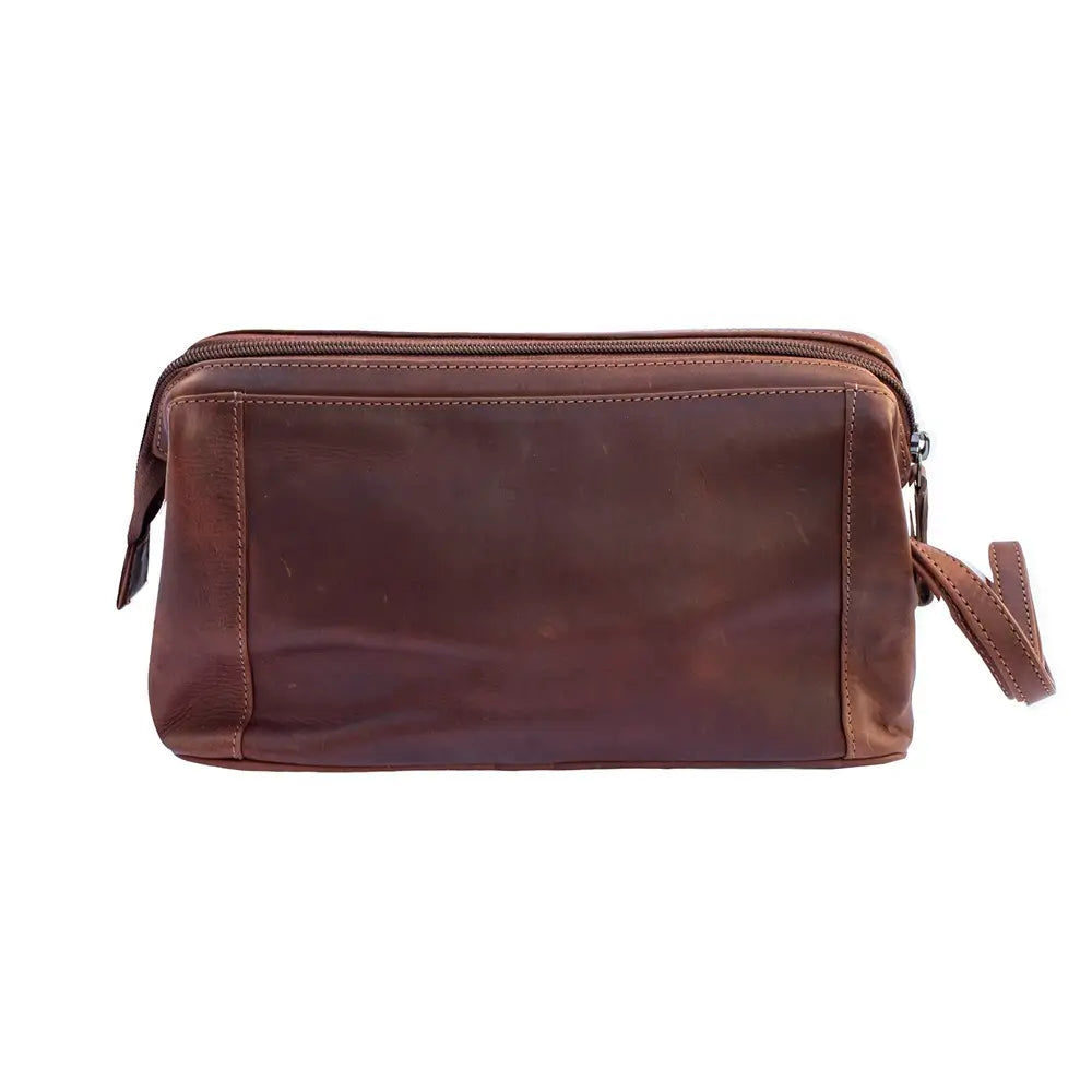 A cognac leather zippered pouch with a matching wrist strap, shown against a plain white background.