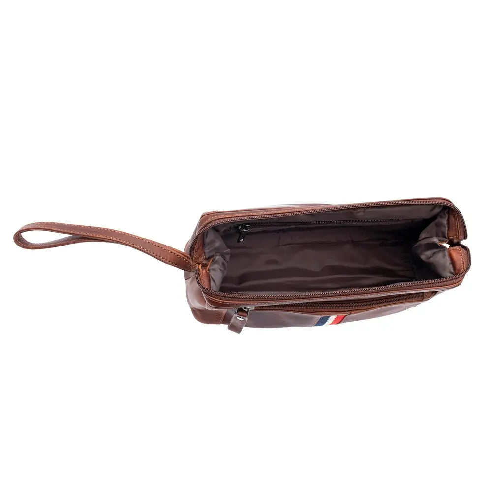 A cognac washbag with a wrist strap, shown open to reveal its interior lining against a plain white background.