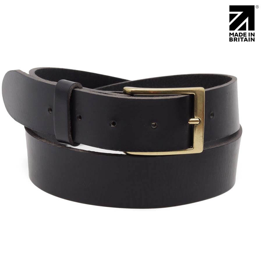 A black leather belt with a gold-tone rectangular buckle, coiled on a white background with a 'MADE IN BRITAIN' logo in the top right corner.