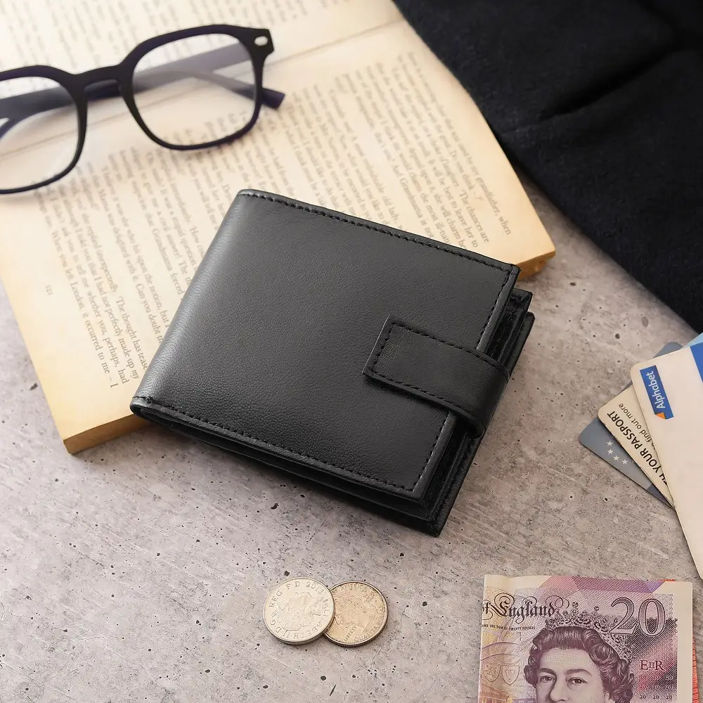 Flat lay of Basic Wallet Style 44 on a table, styled with everyday essentials.