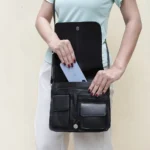 Close-up of the interior compartments of the Large black Organiser Bag, showcasing its multiple storage options.