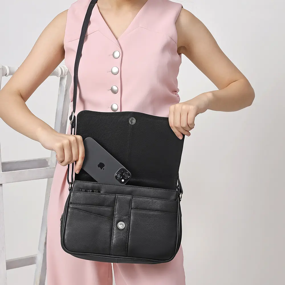 Black leather organiser bag for women - Victoria 871. Soft leather bag with flap open, showing pen holders and pouch pockets.