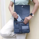 Close-up of the interior compartments of the Large black Organiser Bag, showcasing its multiple storage options.