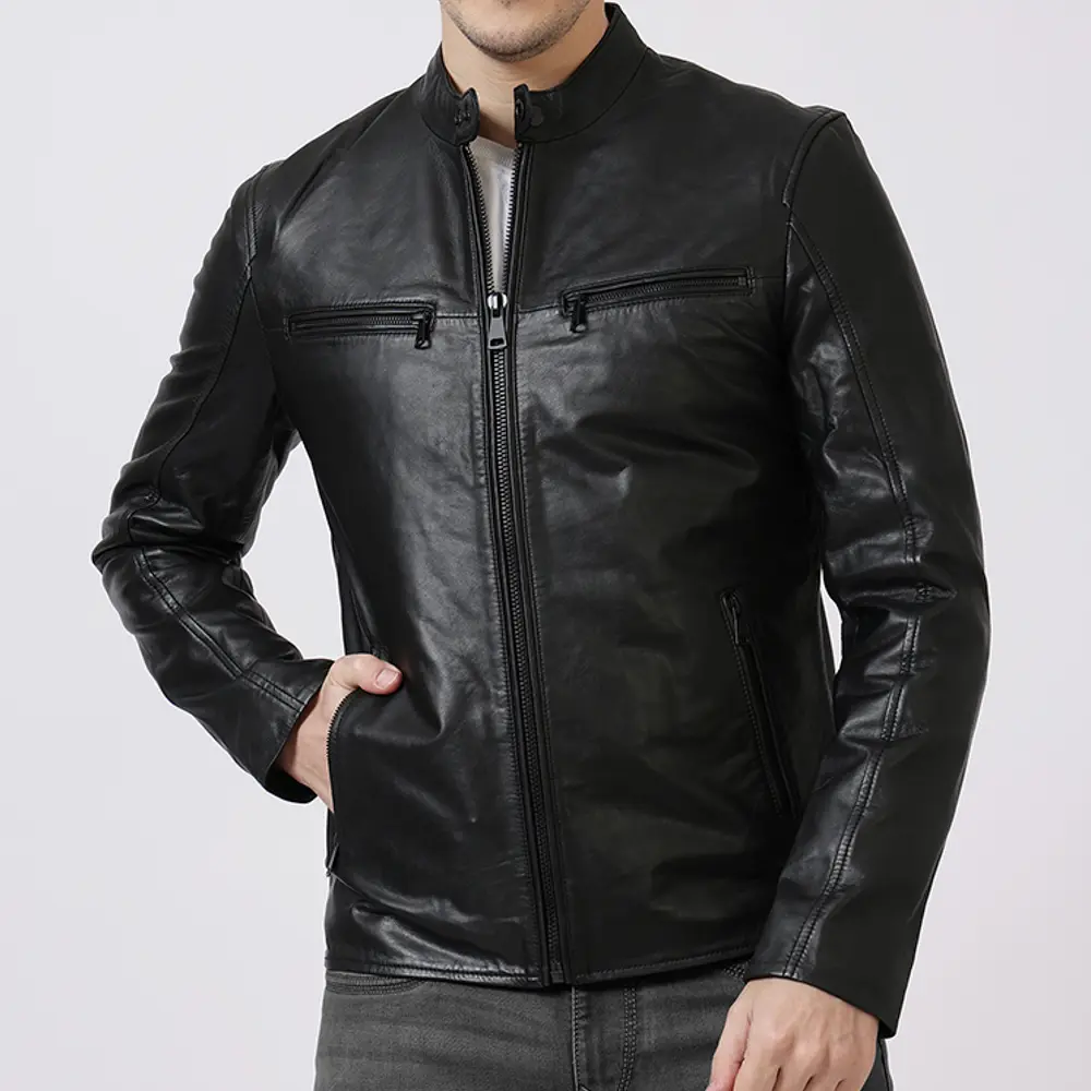 Close-up of the chest and collar area on the men's racer-style leather jacket, featuring durable zipped pockets and sleek stitching