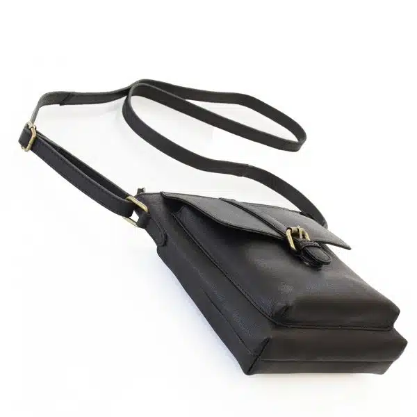 black leather crossbody bag with front buckle.