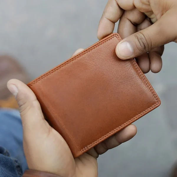 The Leon 5701 Men’s Bifold Leather Wallet combines timeless style with modern functionality