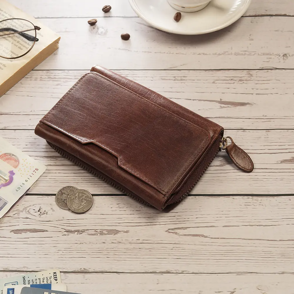 The brown zip-around leather purse styled on a flat lay setup, showcasing its sophisticated design ideal for retail displays.