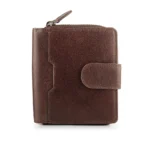 brown leather bifold purse standing upright, showcasing its soft leather texture and zip-around compartment.