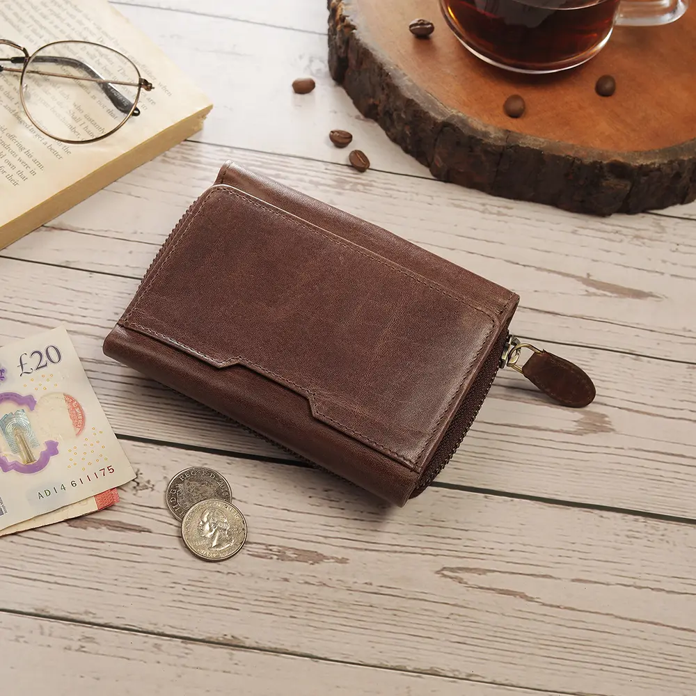 Medium brown Trifold Purse displayed in a lifestyle setting on a textured fabric, illustrating its timeless appeal and versatile style.