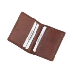 Organised view of the brown leather RFID bifold wallet neatly filled with cards to show its storage capacity.