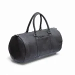 Side view of the Columbus Black Leather Holdall with detachable, adjustable shoulder strap.
