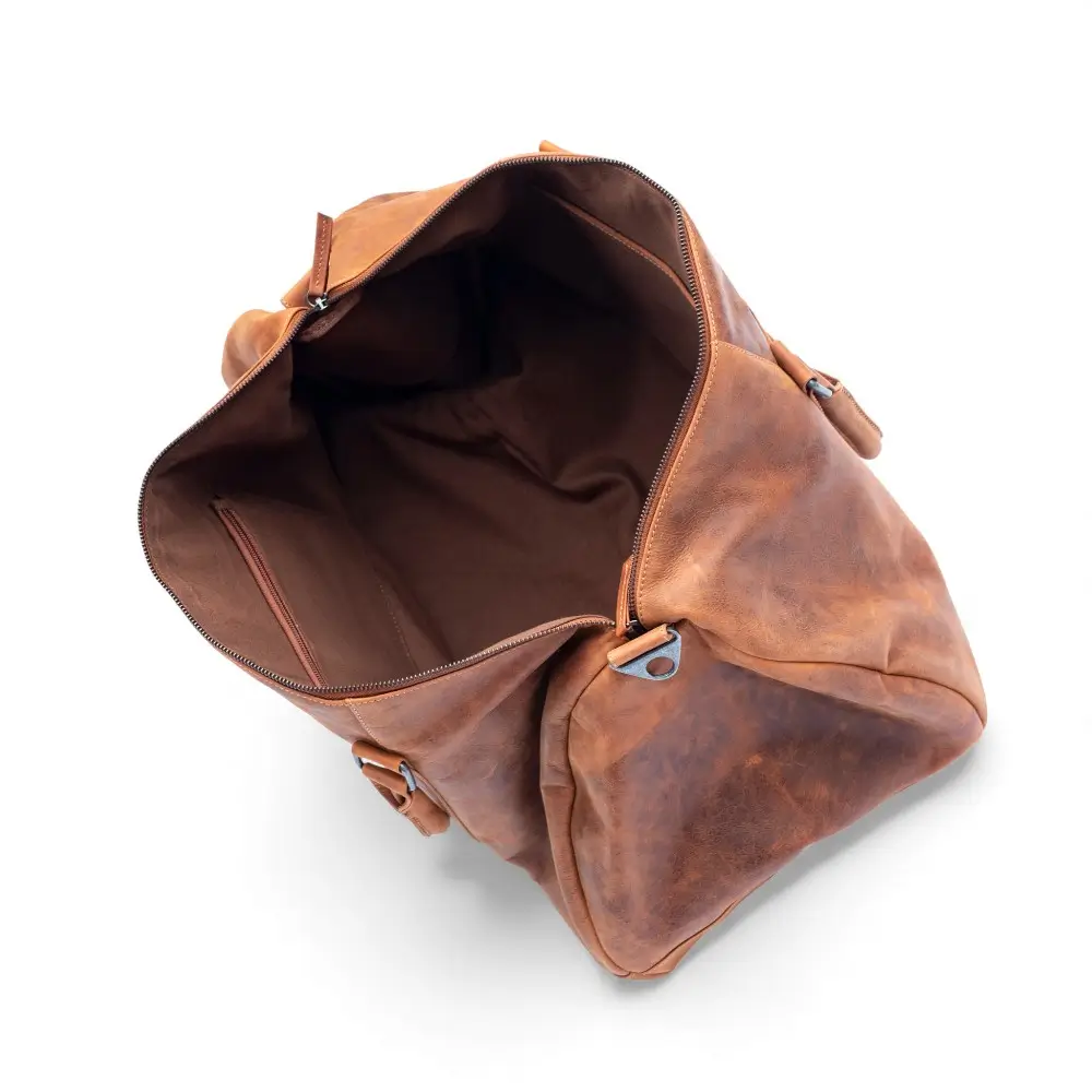 Open view of the Hunter Leather Holdall revealing the fabric-lined interior and spacious storage area.